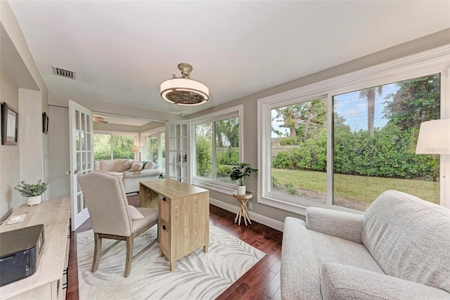 sunroom / solarium featuring plenty of natural light