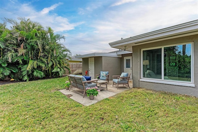 view of yard featuring a patio area and outdoor lounge area