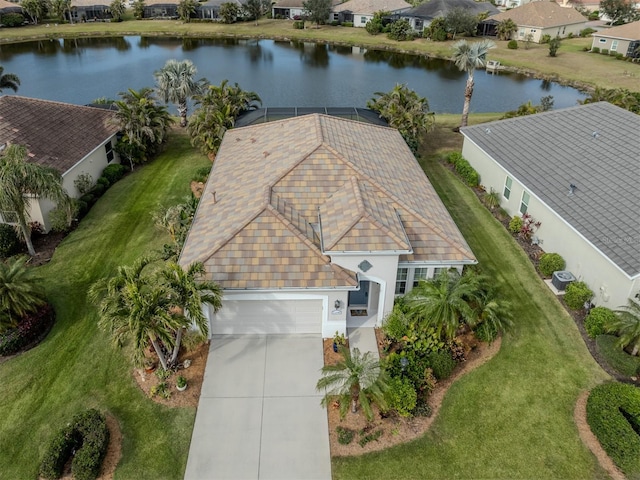 drone / aerial view with a water view