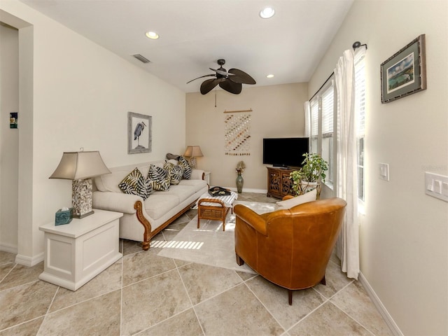 living room with ceiling fan