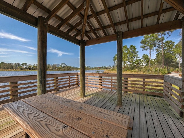 wooden terrace with a gazebo and a water view