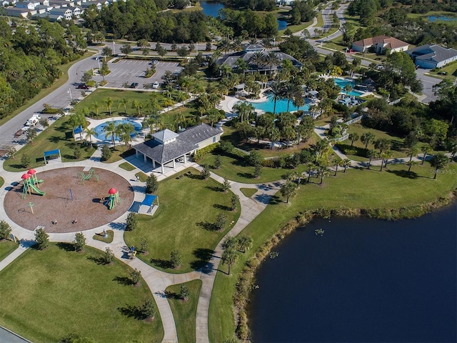 birds eye view of property with a water view