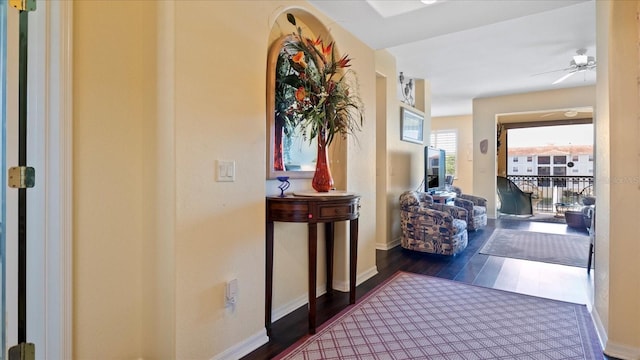 hall with dark hardwood / wood-style floors