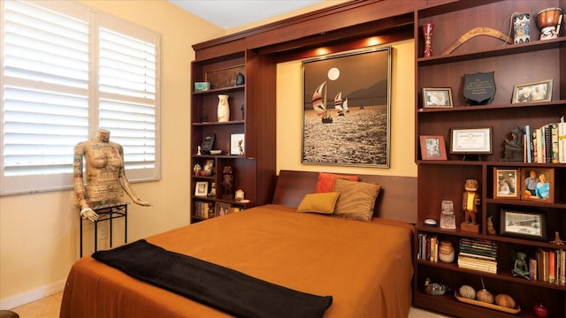 bedroom with tile patterned floors