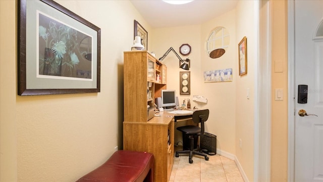 home office featuring light tile patterned floors