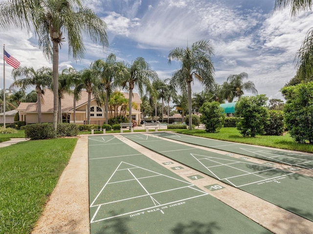 view of home's community featuring a yard