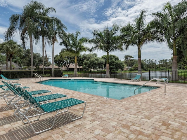 view of swimming pool with a patio area