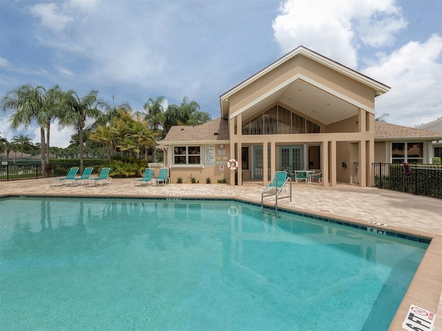 view of swimming pool with a patio area