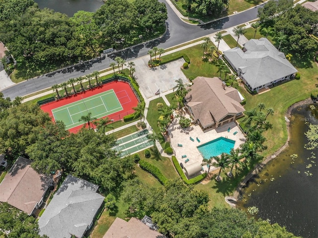 birds eye view of property with a water view