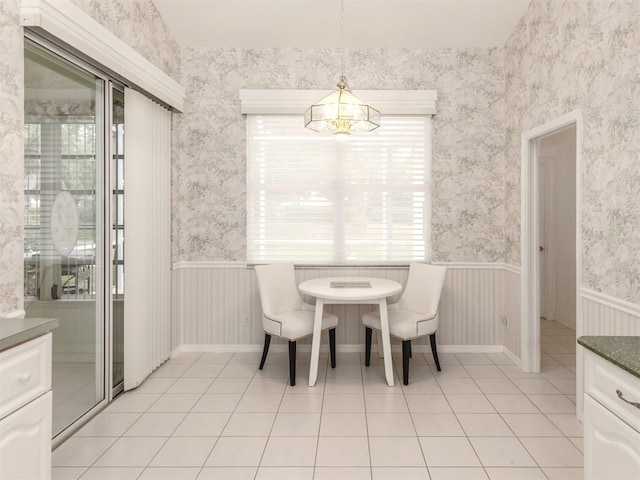 dining space with light tile patterned floors