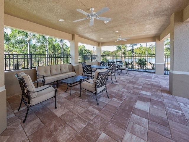 view of patio / terrace with an outdoor hangout area and ceiling fan