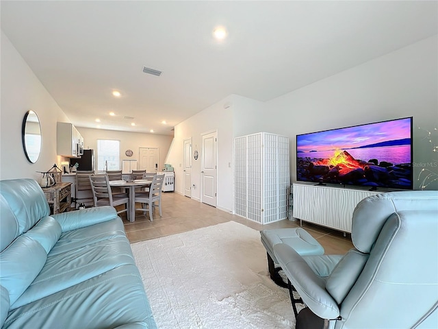 living room with light tile patterned flooring