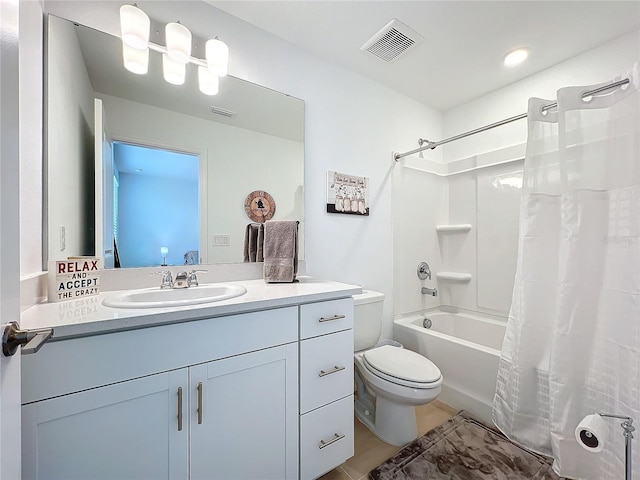 full bathroom with vanity, toilet, and shower / tub combo