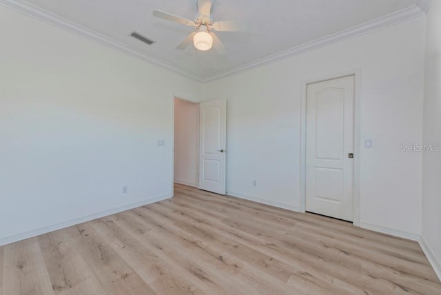 unfurnished room featuring crown molding, ceiling fan, and light hardwood / wood-style flooring