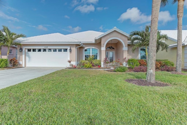 ranch-style house with a front lawn and a garage