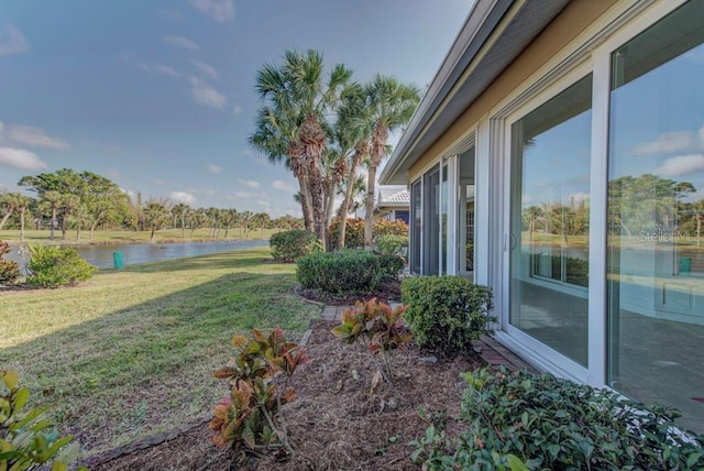 view of yard featuring a water view