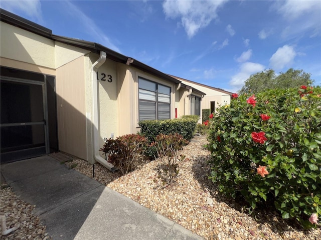 view of property exterior with stucco siding