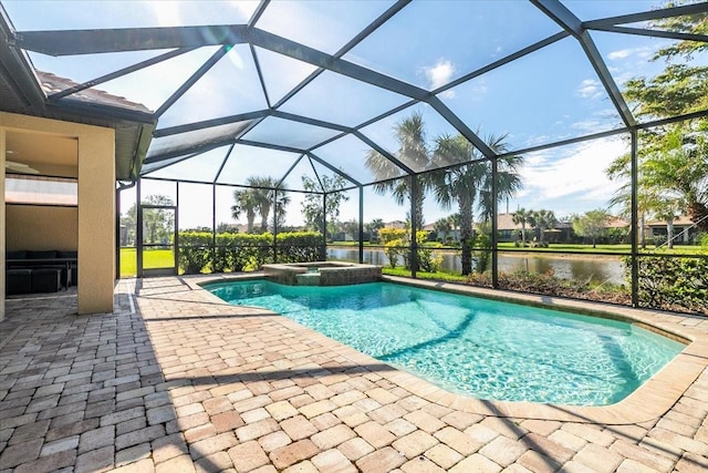 view of swimming pool featuring an in ground hot tub, a patio, a water view, and glass enclosure