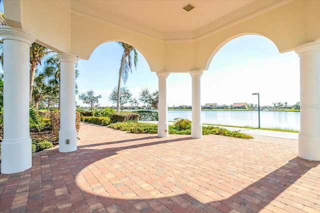 view of patio featuring a water view