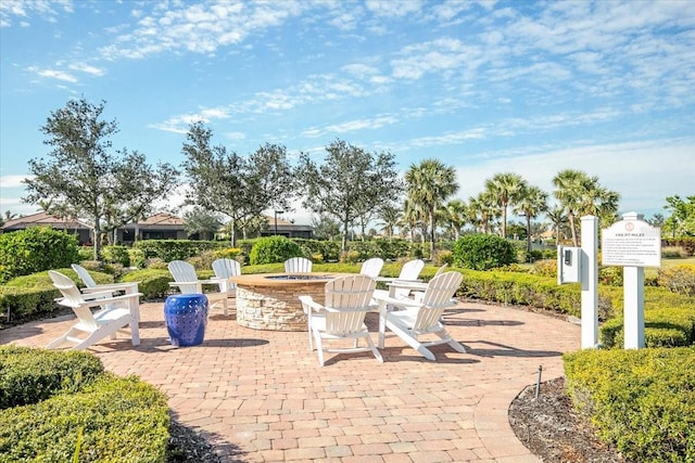 view of patio / terrace with a fire pit