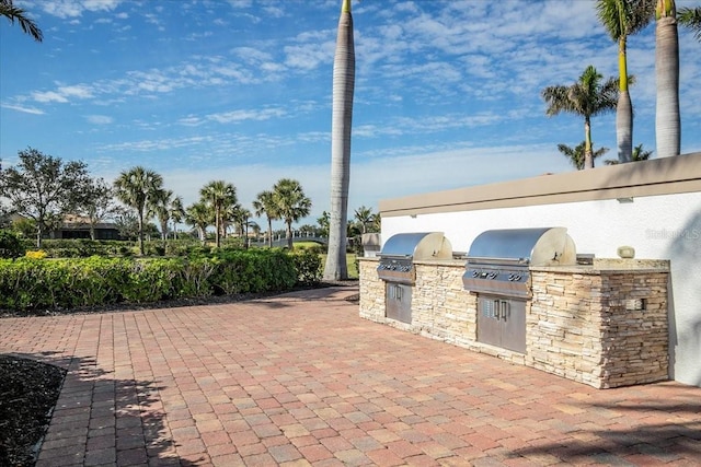 view of patio / terrace featuring grilling area and exterior kitchen