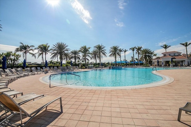 view of swimming pool with a patio