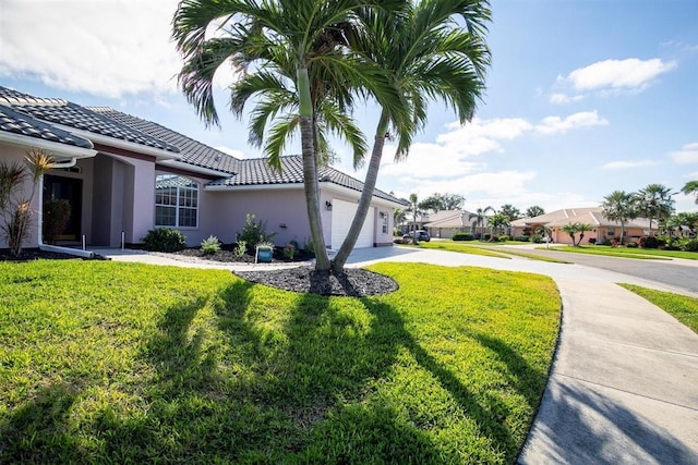 view of yard featuring a garage