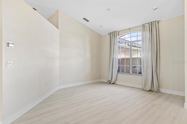 unfurnished room featuring light wood-type flooring