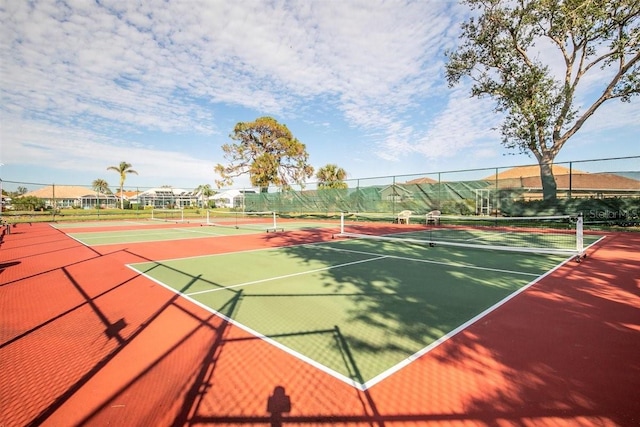 view of sport court featuring basketball hoop