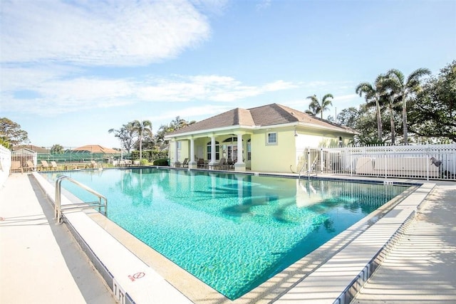 view of swimming pool with a patio area