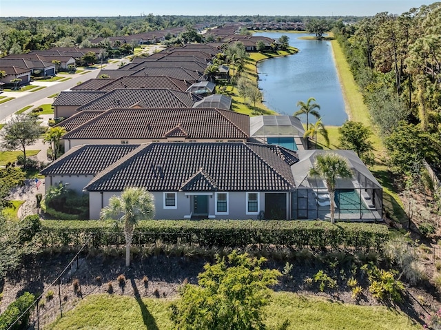 aerial view with a residential view and a water view