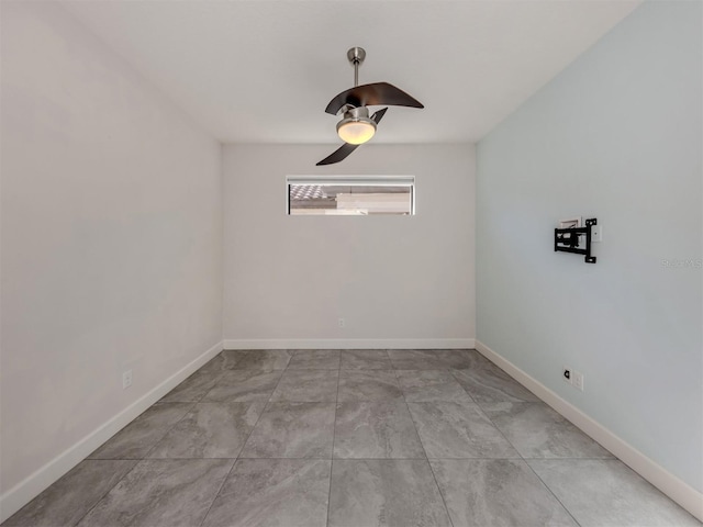 5733 Semolino St, Nokomis, FL 34275 - spare room featuring ceiling fan and baseboards