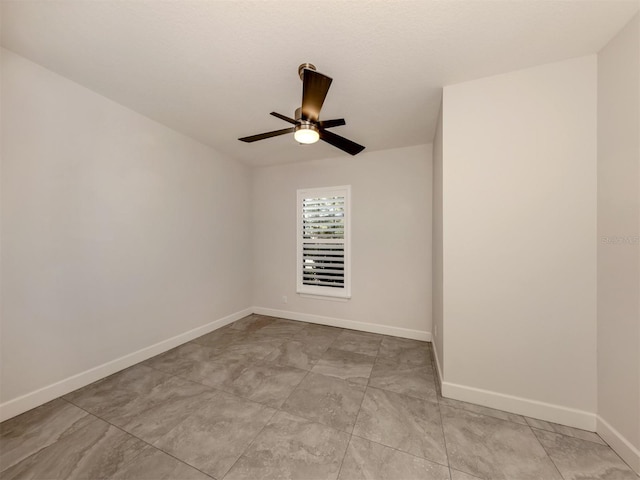 5733 Semolino St, Nokomis, FL 34275 - empty room featuring baseboards and a ceiling fan