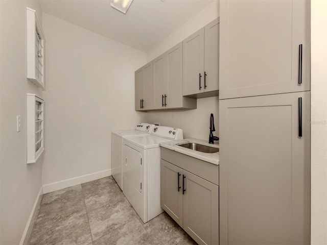 5733 Semolino St, Nokomis, FL 34275 - washroom with washer and dryer, cabinet space, and baseboards