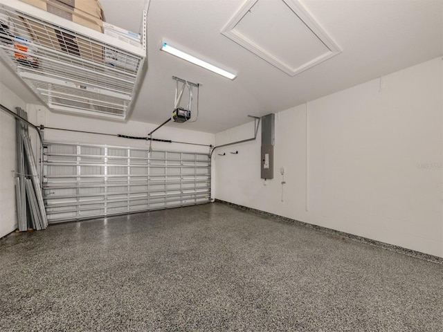 5733 Semolino St, Nokomis, FL 34275 - garage with a garage door opener and electric panel