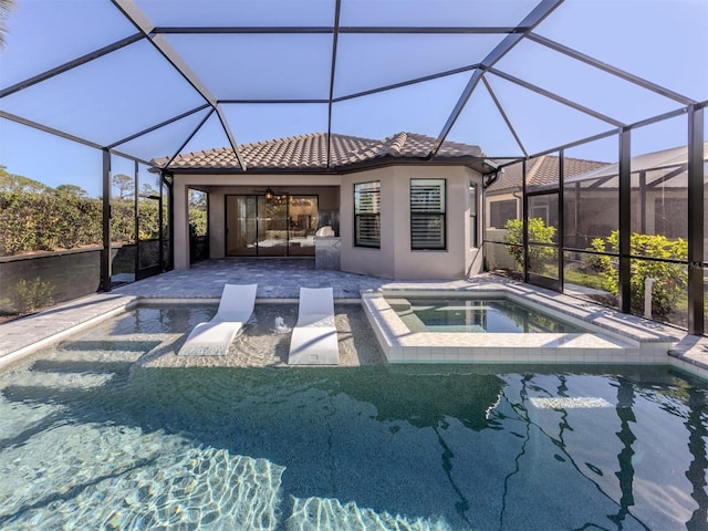 5733 Semolino St, Nokomis, FL 34275 - view of pool with a patio, a ceiling fan, glass enclosure, and a pool with connected hot tub