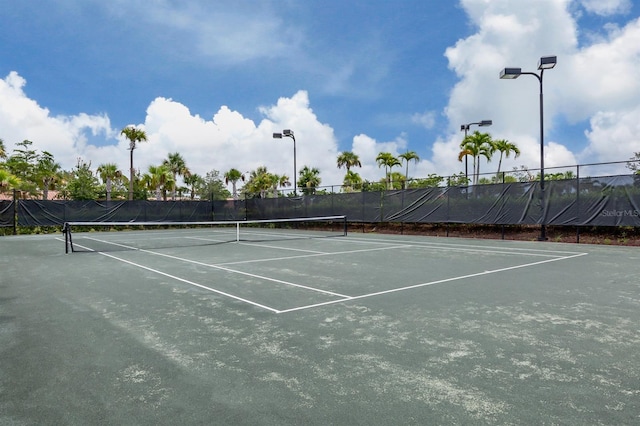 5733 Semolino St, Nokomis, FL 34275 - view of tennis court with community basketball court
