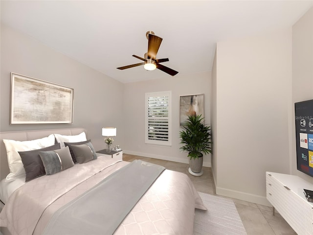 5733 Semolino St, Nokomis, FL 34275 - bedroom with baseboards and a ceiling fan