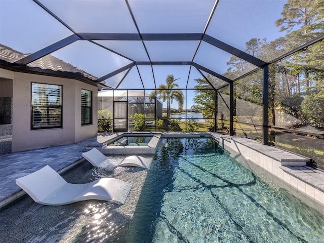 5733 Semolino St, Nokomis, FL 34275 - view of swimming pool featuring a pool with connected hot tub, a patio area, and a lanai