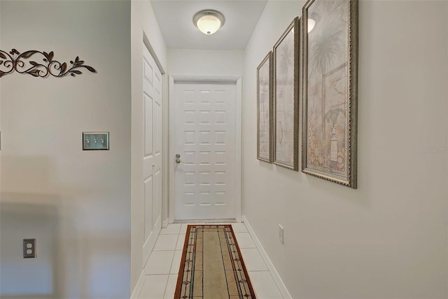 hallway with light tile patterned flooring