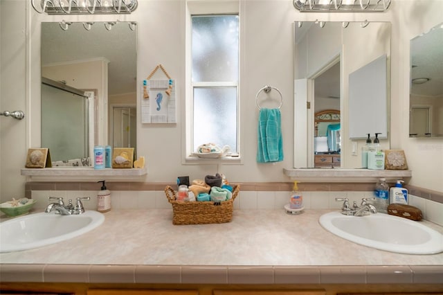 bathroom featuring vanity and walk in shower