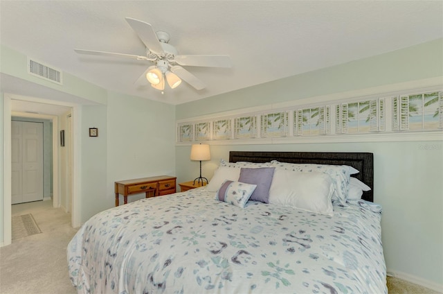 carpeted bedroom featuring ceiling fan