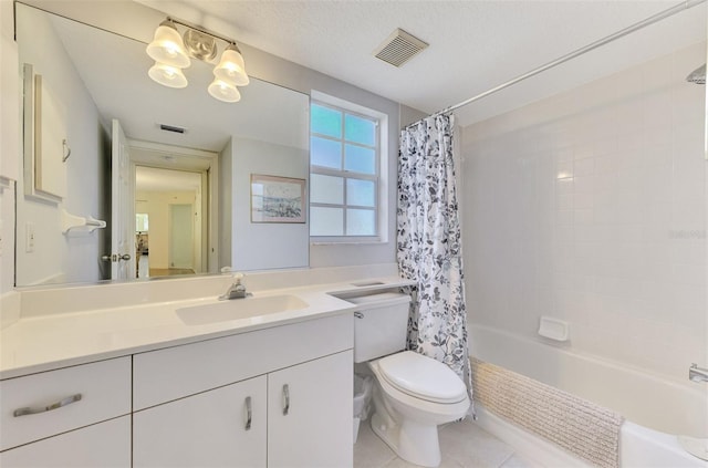 full bathroom with a textured ceiling, vanity, shower / tub combo with curtain, a notable chandelier, and toilet