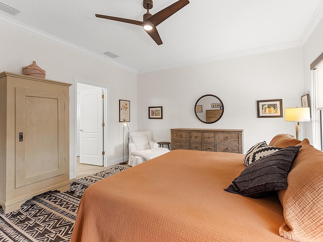 bedroom featuring ceiling fan and ornamental molding