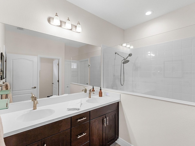 bathroom featuring vanity and walk in shower