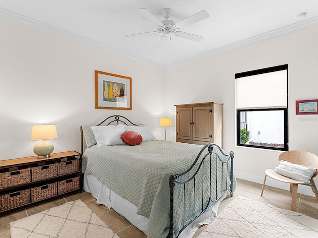 bedroom with ceiling fan and crown molding