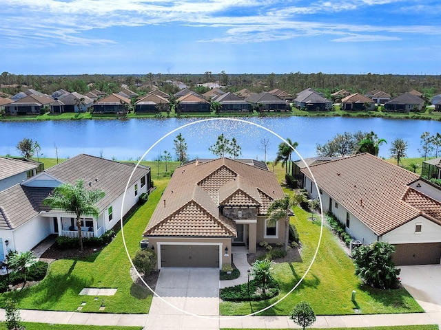 drone / aerial view featuring a water view