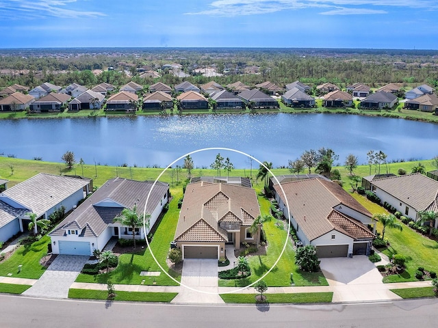 birds eye view of property featuring a water view