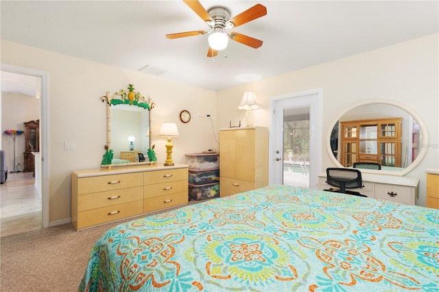 carpeted bedroom with access to outside and ceiling fan