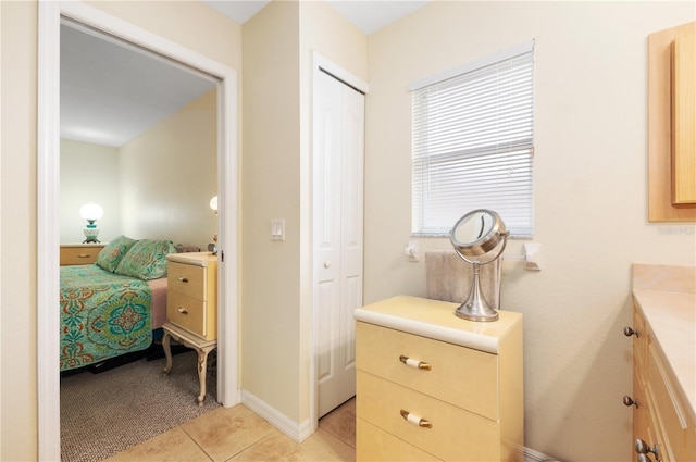 bathroom featuring vanity and tile patterned floors